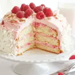 Coconut Cake with Raspberry Buttercream Filling