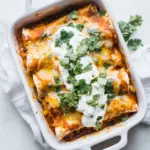 Spicy Black Bean Chicken Enchiladas with Pumpkin Sour Cream Sauce